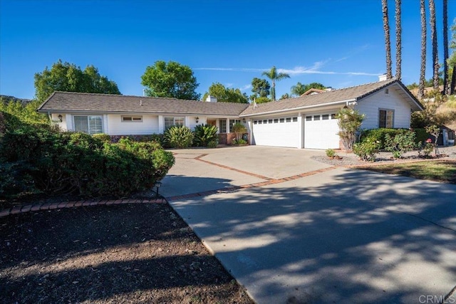 ranch-style home with a garage