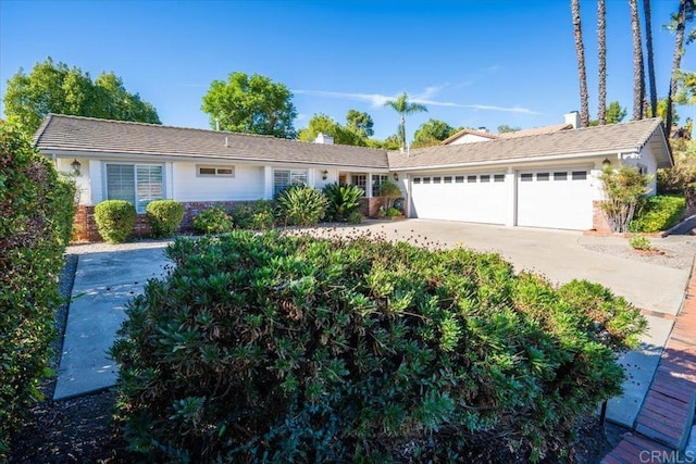 ranch-style home with a garage