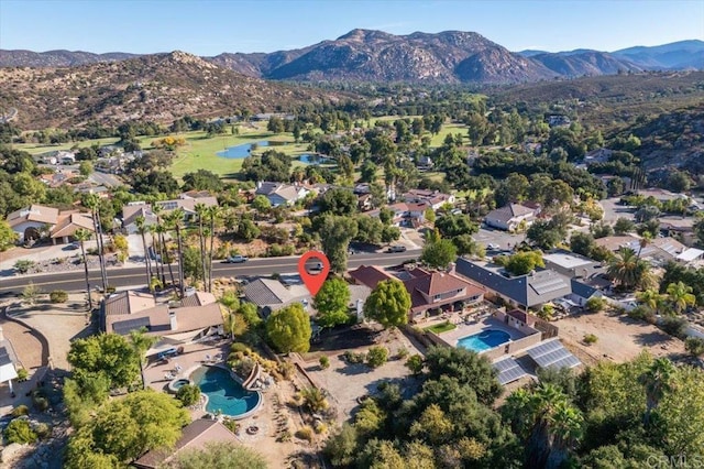 aerial view featuring a mountain view