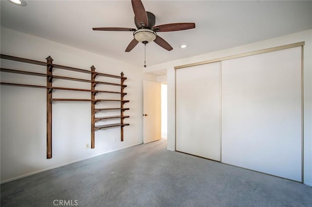 unfurnished bedroom featuring a closet and ceiling fan