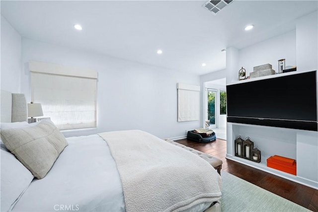 bedroom featuring hardwood / wood-style floors