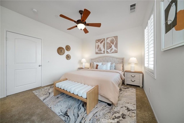 bedroom with ceiling fan and carpet flooring