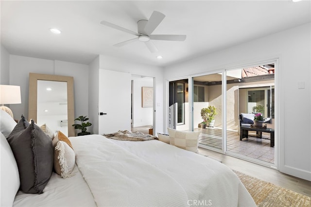 bedroom with recessed lighting, wood finished floors, a ceiling fan, and access to exterior