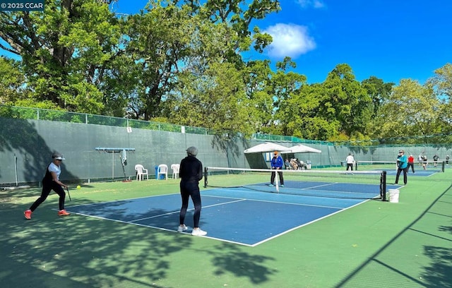 view of sport court featuring basketball court