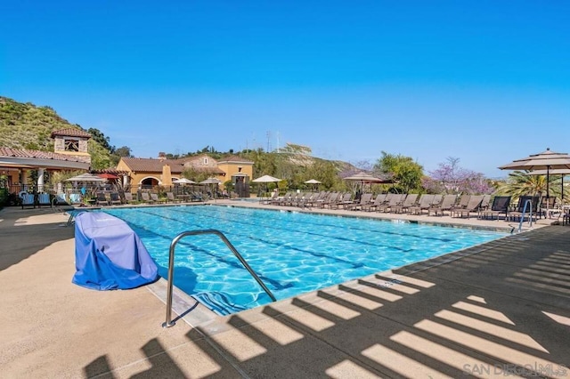 view of swimming pool with a gazebo and a patio area