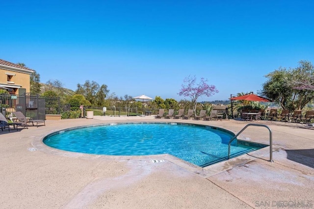 view of pool featuring a patio