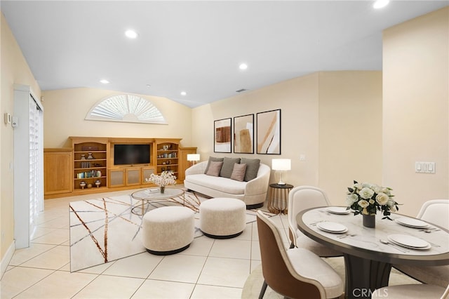 tiled living room with vaulted ceiling