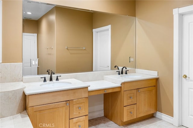 bathroom with vanity and tile patterned floors