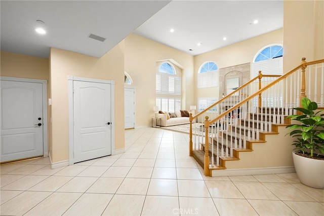 entryway featuring light tile patterned floors