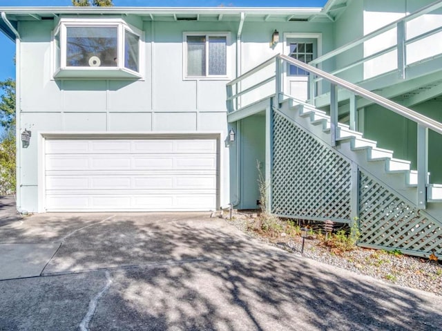 view of front of property with a garage