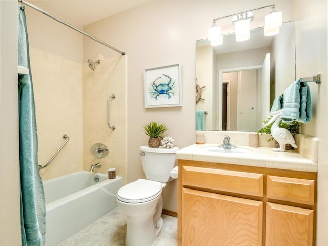 full bathroom featuring vanity, tiled shower / bath combo, and toilet