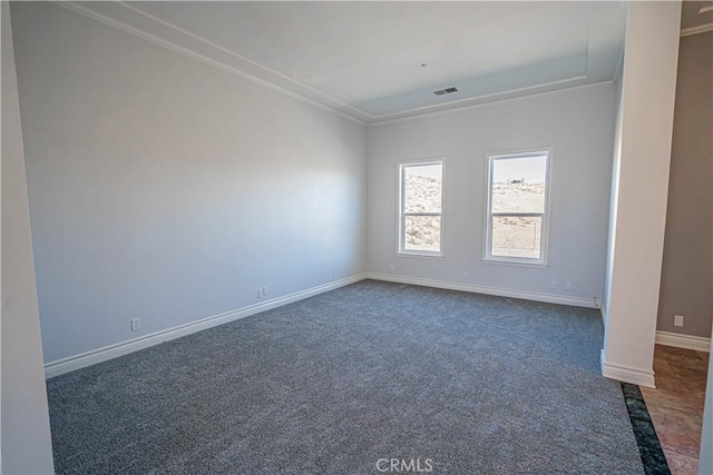 empty room with dark carpet