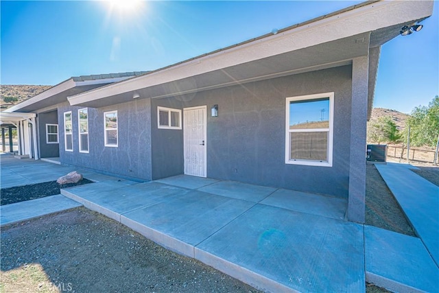 view of front of home featuring a patio area