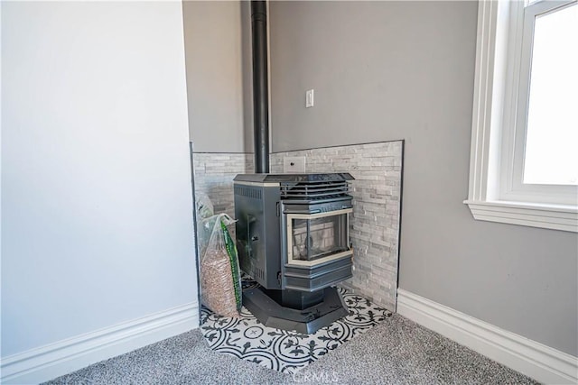 interior details featuring a wood stove