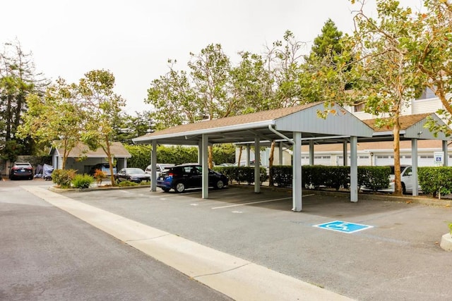 view of vehicle parking featuring a carport