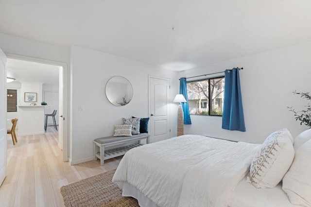 bedroom featuring light wood-type flooring