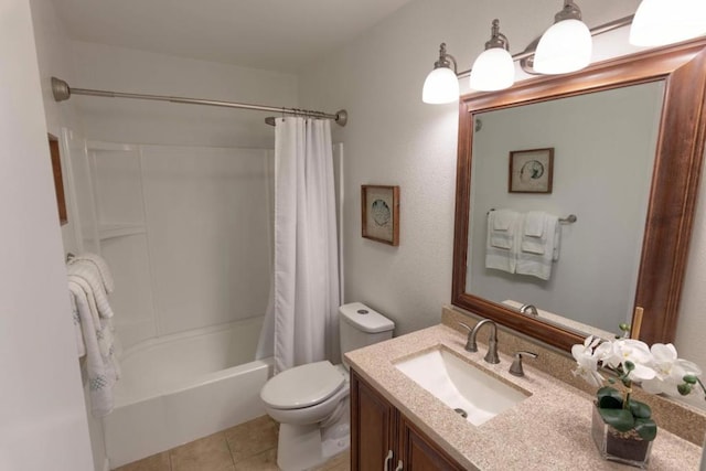 full bathroom with tile patterned floors, vanity, toilet, and shower / tub combo