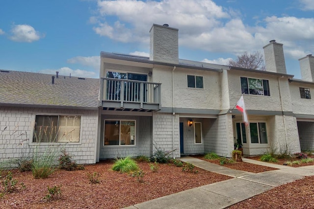 exterior space featuring a balcony