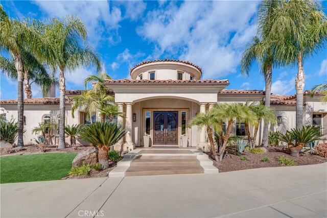 view of front facade featuring french doors