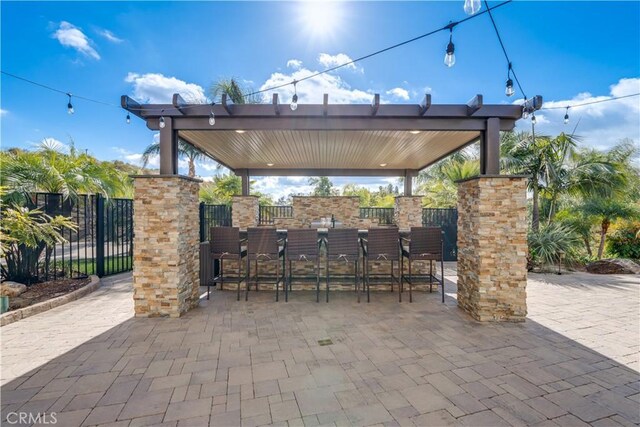 view of patio / terrace with a bar