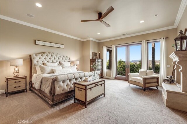 carpeted bedroom with ornamental molding and ceiling fan