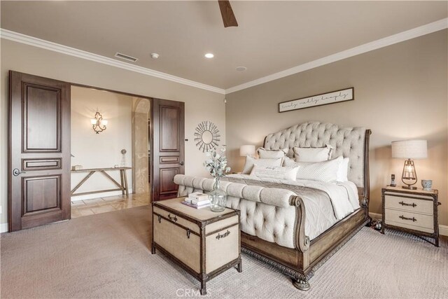 bedroom featuring crown molding, ceiling fan, and light colored carpet