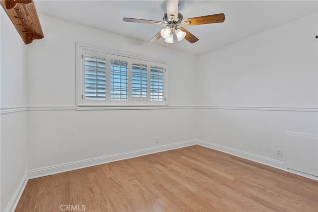 spare room with ceiling fan and light hardwood / wood-style flooring