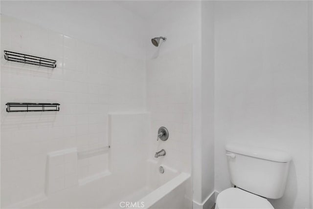 bathroom with shower / bathtub combination and toilet