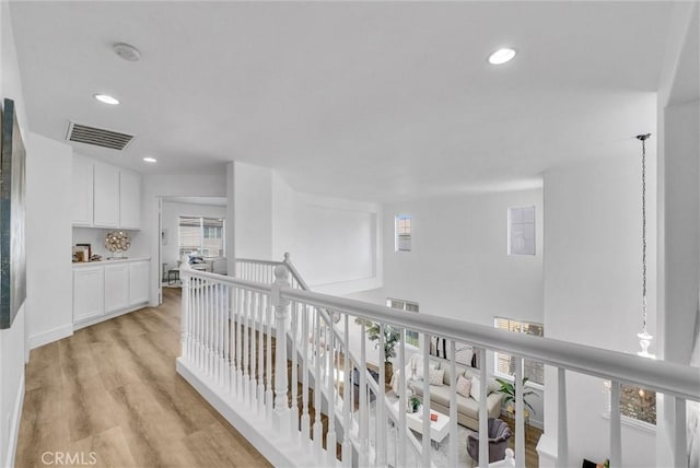 hall featuring light hardwood / wood-style flooring