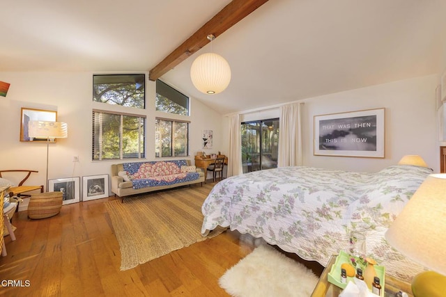 bedroom featuring hardwood / wood-style flooring, vaulted ceiling with beams, and access to outside