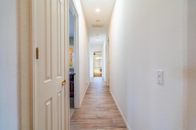 hallway featuring light hardwood / wood-style floors