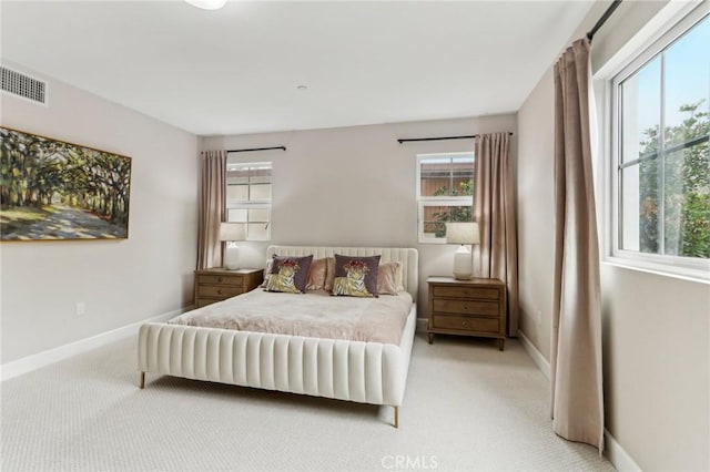 bedroom with light carpet