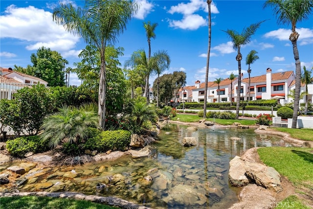 view of property's community featuring a water view