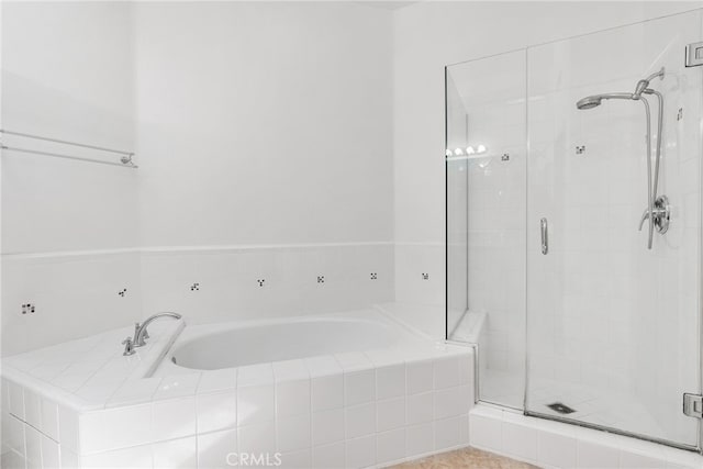 bathroom with independent shower and bath