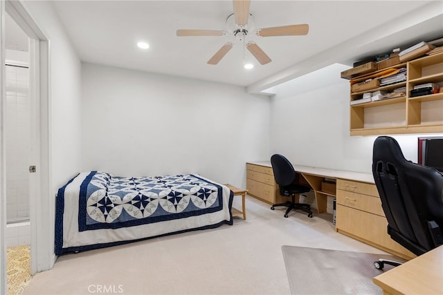 bedroom featuring ceiling fan and light colored carpet