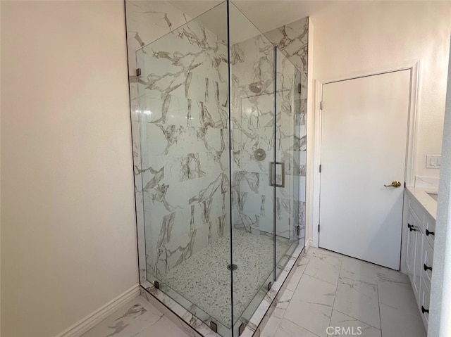 bathroom with vanity and a shower with shower door