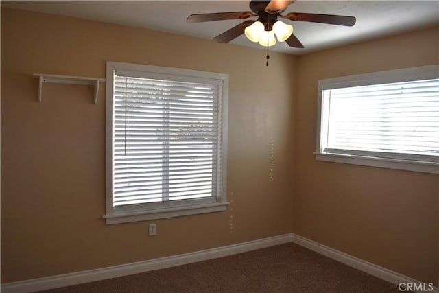 carpeted empty room with ceiling fan