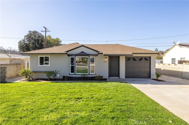 ranch-style house with a garage and a front yard