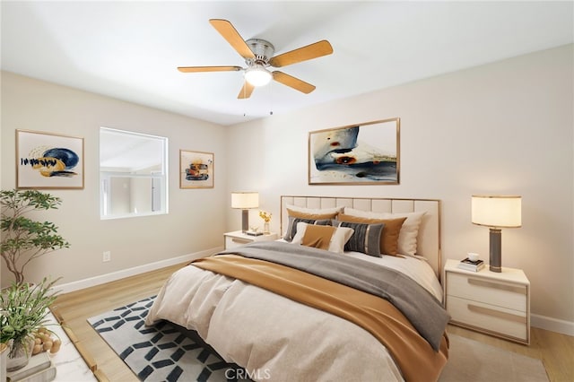 bedroom featuring ceiling fan and light wood-type flooring