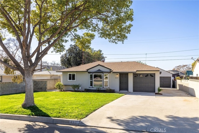 single story home with a garage and a front lawn