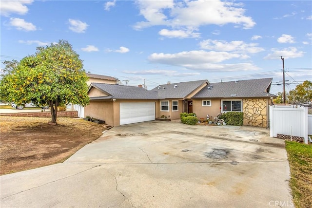 single story home with a garage