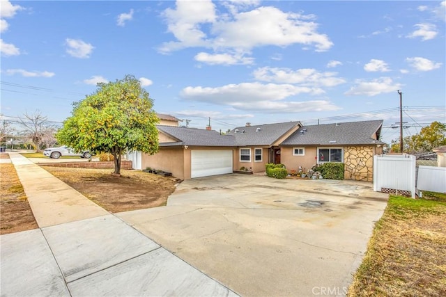 ranch-style house featuring a garage