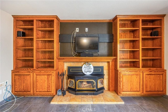 living room featuring a wood stove