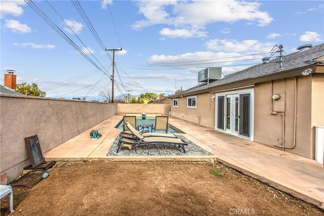 view of patio with central air condition unit