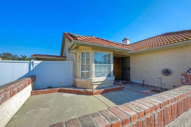 view of front of house with a patio