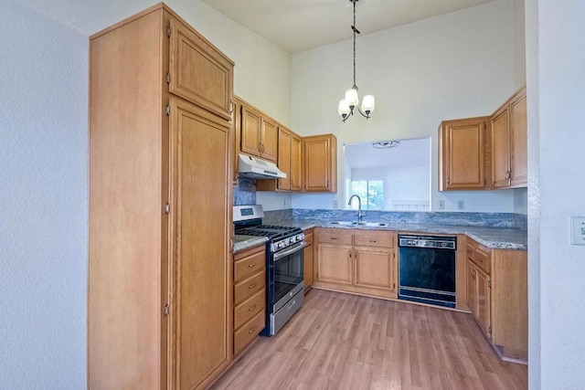 kitchen featuring sink, stainless steel gas stove, light hardwood / wood-style flooring, black dishwasher, and pendant lighting