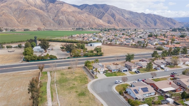 drone / aerial view featuring a mountain view