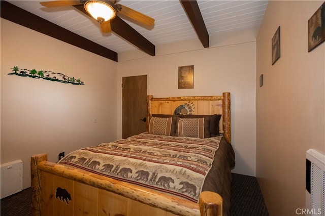 carpeted bedroom with beam ceiling, heating unit, wooden ceiling, and ceiling fan