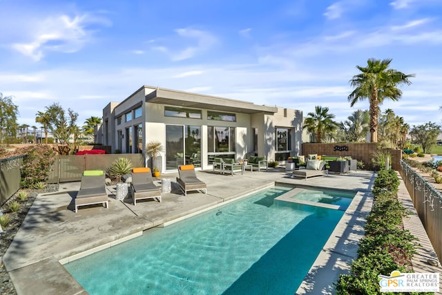 view of swimming pool with a patio area