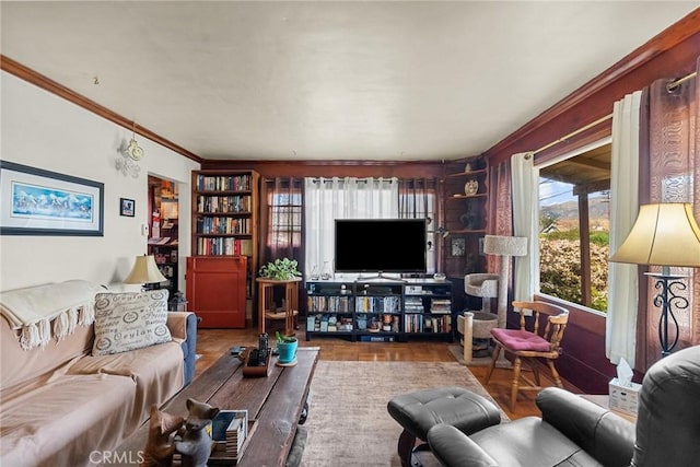 living room with parquet floors and crown molding